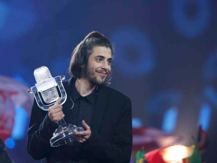 Portugal's Salvador Sobral celebrates after winning the grand final of the Eurovision Song Contest 2017 at the International Exhibition Centre in Kiev